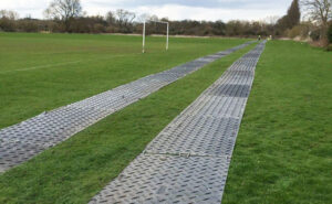 Twin trackway across football sports field