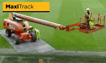 Temporary ground grass turf protection for cherry picker in sports stadium